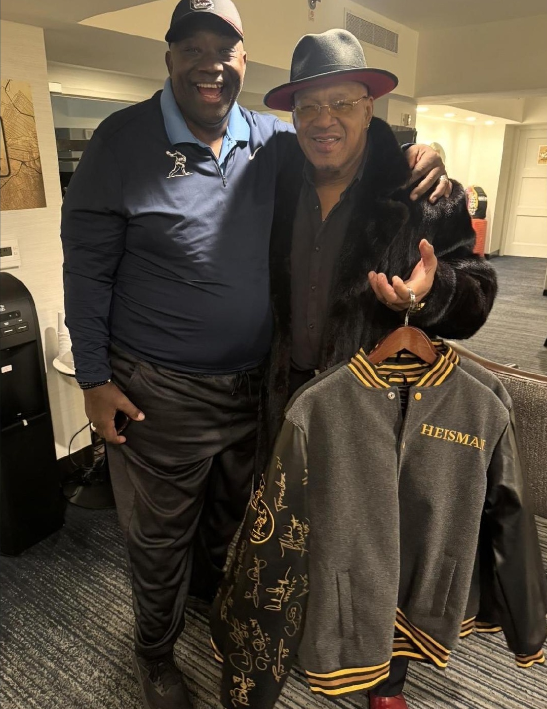 Heisman winners George Rogers and Mike Rozier